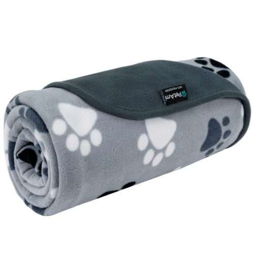Soft waterproof throw blanket for dogs protecting a beige sofa from spills and accidents